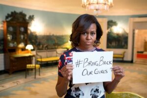 First Lady Michelle Obama’s tweeted photo of herself holding a sign reading #BringBackOurGirls—pictured here—was the right thing to do, but it’s a shame that it took three weeks for her tweet reacting to the Nigeria kidnapping crisis to arrive, writes Rafael Medoff. (Photo: Twitter)