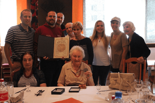 Hearing from two living legends, a Holocaust survivor and a Righteous Among the Nations. (Photo: Breaking Israel News)