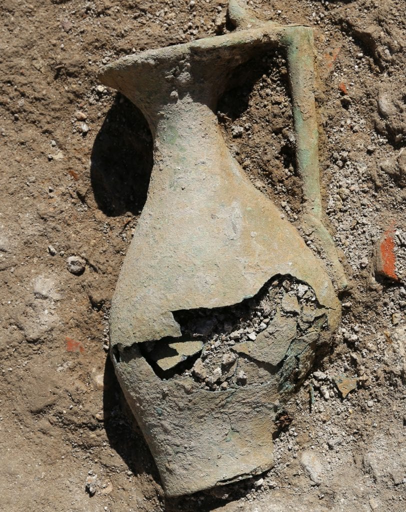 The jug as it was discovered in the excavation. (Photo: Eyad Bisharat/Israel Antiquities Authority/TPS)