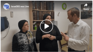 Rabbi Tuly Weisz distributes funds to the families of the Mount Meron tragedy